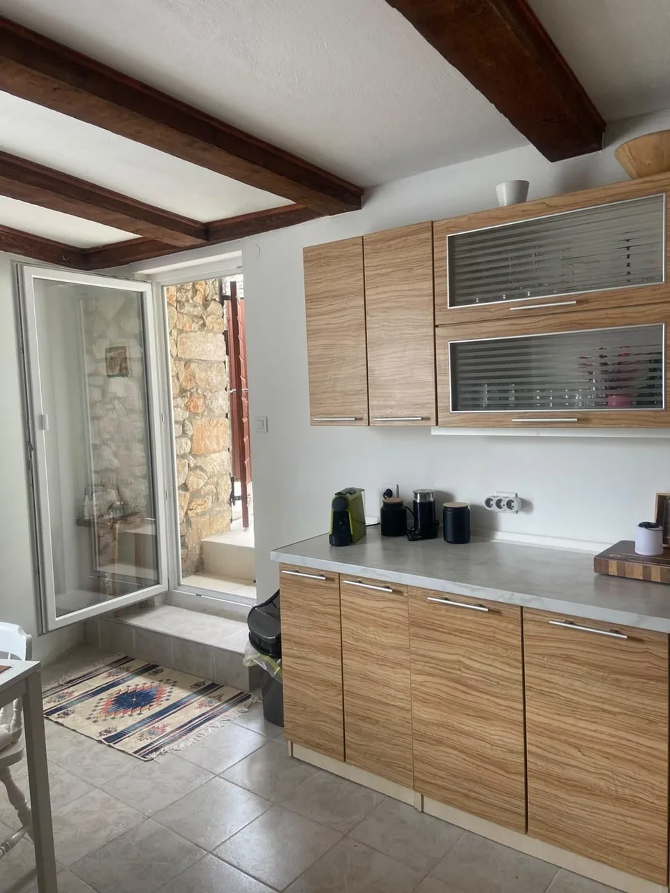 The kitchen counter and the open door